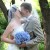 Kiss under veil with flowers