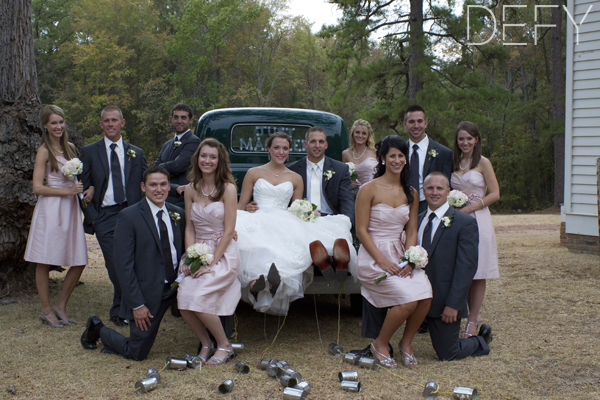 entire bridal party around truck