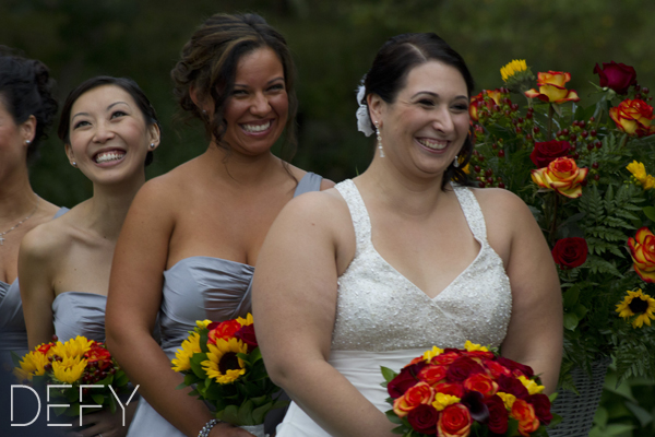 Bride and bridesmaids giggling