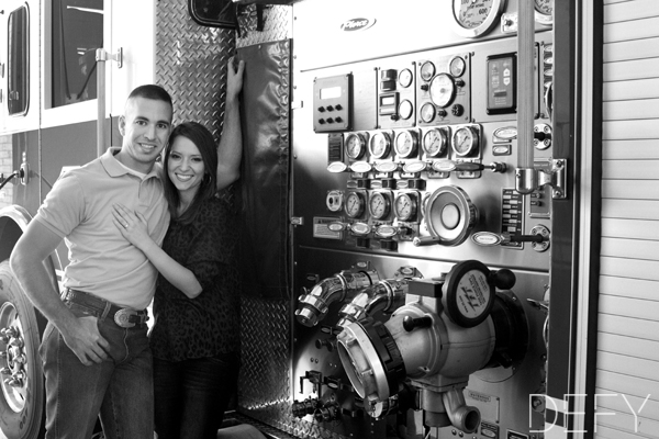 Couple next to fire truck